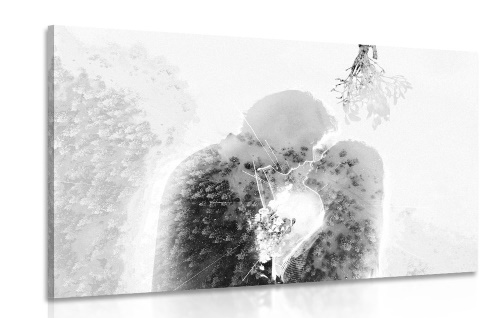 Obraz zamilovaný pár pod jmelím v černobílém provedení