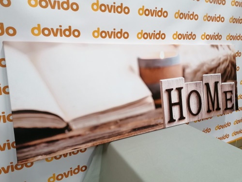 Obraz dřevěné písmenka s nápisem Home