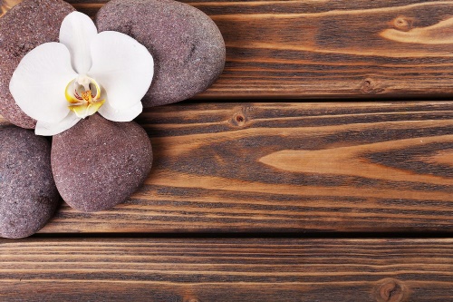 Fototapeta wellness kameny na dřevě