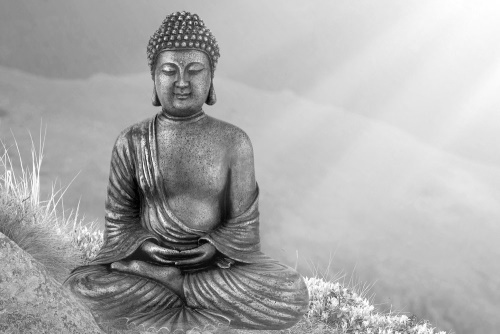 Obraz socha Budhy v meditující poloze v černobílém provedení